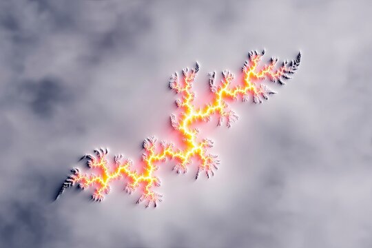 An abstract fractal design with a glowing yellow and orange energy pattern against a cloudy gray background.