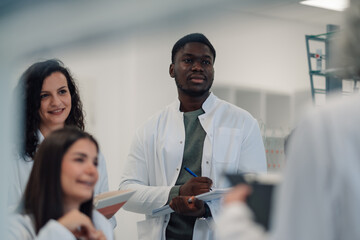 Diverse medical students learning healthcare science in lab