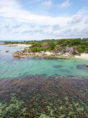 Naklejka premium Belitung drone landscape, Tanjung Tinggi beach, a famous iconic beach with big rocks in Belitung, Indonesia. Also known as Laskar Pelangi beach