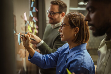 Diverse business team collaborating during a brainstorming meeting