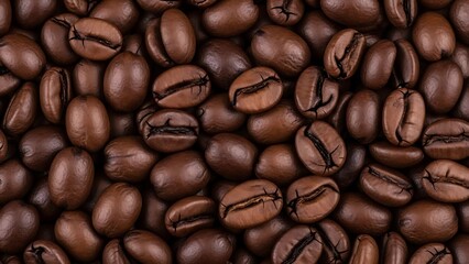 Closeup macro shot of roasted brown coffee bean background texture