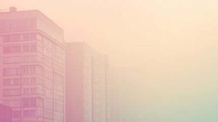 Softly lit tall building facade with pastel hues and foggy atmosphere