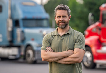 Transportation vehicles. Semi trucks vehicle. Hispanic man trucker. Hispanic man driver in front of truck. Trucking owner. Truck driver. Man trucker driver near lorry truck, copy space