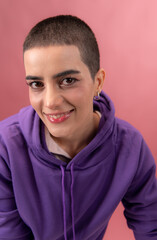 Fototapeta premium Portrait of young woman cheerful young woman with a buzz cut