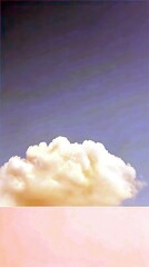 A fluffy cloud formation against a gradient sky with pink and purple hues. The image evokes a sense of peace and serenity.