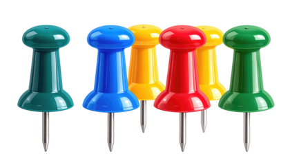 Colorful pushpins a close up of green, blue, yellow, and red pushpins with shiny silver pins against black