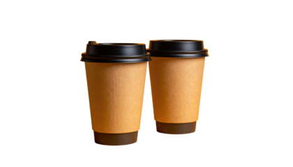 Two paper coffee cups with black lids stand close together against a black background in a studio shot
