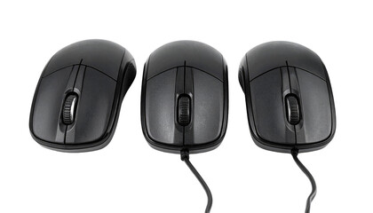 Three identical black computer mice aligned on a dark surface, showing cables and scroll wheels in a high-key lighting