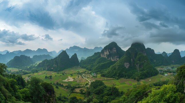 Dramatic karst mountains landscape under a cloudy sky