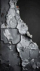 Cracked gray wall with exposed edges