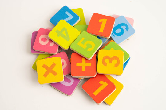 Number wood block cubes for learning Mathematic, education math concept.