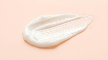 Macro close-up of smooth skincare cream smear on a clean white or pastel background. Elegant curves and subtle highlights emphasize texture, freshness and premium skincare aesthetic