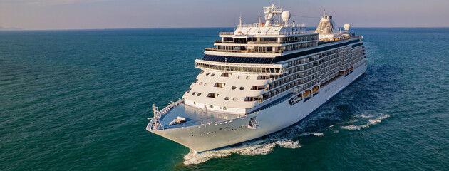 Cruise ships are sailing the seas, taking tourists on a journey around the world.