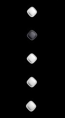 Close-up of a row of buttons against a black background. The buttons are square with rounded corners, alternating between white and black.