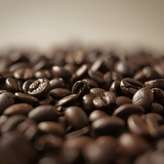 A close-up shot of premium roasted coffee beans, showcasing their rich brown tones and glossy texture.