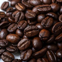 A close-up shot of premium roasted coffee beans, showcasing their rich brown tones and glossy texture.