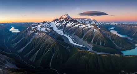 Mount Cook, New Zealand, at sunset with snow-capped peaks and glacial lakes.