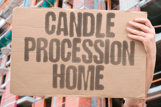 "Candle Procession Home" Relatives carry flames leading decorated infant through dwelling. CANDLE. PROCESSION. FLAME. INFANT. HOME.