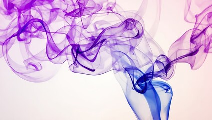 Vibrant and dynamic swirling smoke in shades of purple and blue gracefully dances across a soft, gradient background, creating an ethereal and abstract composition.