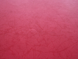 Red paper background with beautiful line patterns. The color is rich and consistent perfect for love cards and messages, crafts.