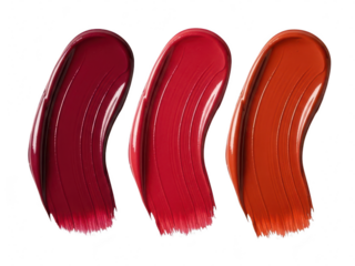 Three rich, vibrant lipstick swatches showing deep berry, bright red, and warm orange shades, isolated on transparent background