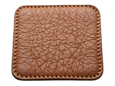 Close up of a square brown leather patch with detailed texture and stitching isolated on transparent background