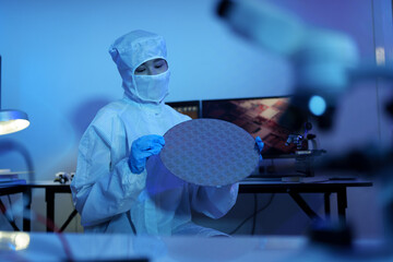 Technician working on analyzing semiconductor or microchip boards, electronics industry, electronic engineer, computer technology, CPU maintenance, hardware, motherboard component upgrades.	