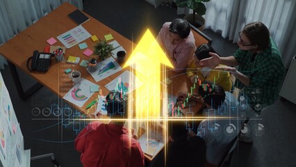 A dynamic office scene showcases a diverse team engaged in strategic planning and data analysis. The image features a graph overlay, symbolizing growth and collaboration. Raster