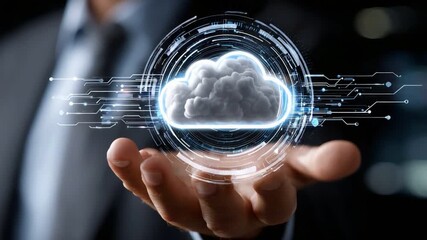 A business professional holds a digital cloud icon, symbolizing modern technology and data storage. The futuristic design emphasizes innovation and the growth of cloud computing. - Powered by Adobe
