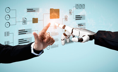 A human hand is reaching towards a robotic hand in front of a digital interface displaying various data and graphical elements, highlighting the synergy between technology and business. Gantry
