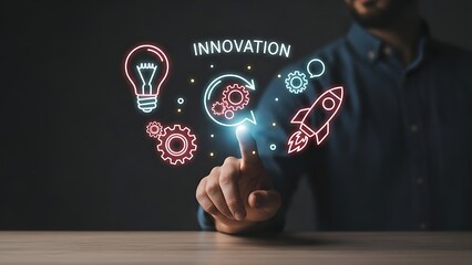 Man touches holographic display of innovation icons for business growth and success.