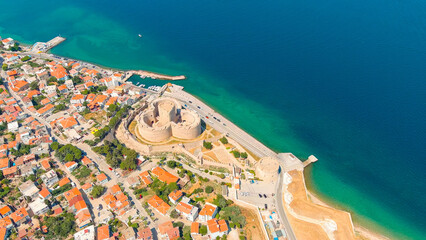 Canakkale, Turkey. Panoramic aerial view of the city on the Asian shore of the Dardanelles Strait, a vibrant Turkish port with ferry terminals and waterfront promenade on a sunny day. Aerial view