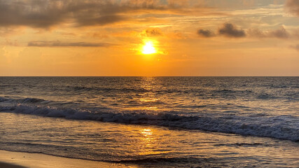 Orange Sunrise in Myrtle Beach with Ocean Waves