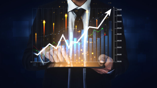 A businessman is utilizing a digital tablet to analyze growth trends represented by a dynamic graph, illustrating financial success and data-driven decision-making. Scalp