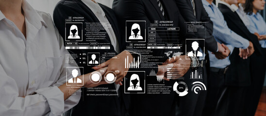 Group of business professionals standing in line, with a digital interface showcasing data analysis and insights, emphasizing teamwork and corporate identity in a modern workplace. Trope