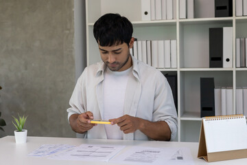 business man use phone to scan barcode or QR codes to pay credit card bill after receiving document invoice online. payment, receive, paying electricity, digital payments without money, technology