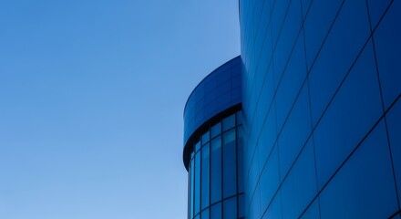 Obraz premium Modern Minimalist Blue Glass Facade Urban Building Architecture Exterior