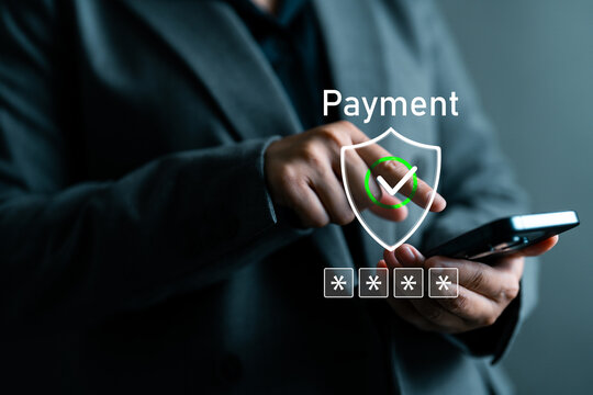 Businesswoman using smartphone with payment security interface, secure mobile transaction, digital wallet protection, financial safety, online authentication and encrypted payment systems.