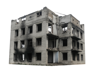 Damaged apartment building, missing windows, war-torn