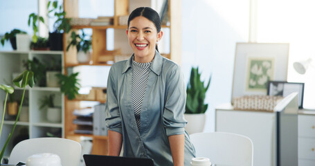 Portrait, smile and woman in office with laptop, about us or founder of eco friendly startup....