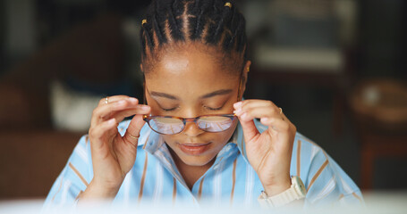 Reading, glasses or black woman in office with tech, eyewear check or better vision for proofreading. Review, adjustment or journalist in agency with specs, draft edit or clear eye sight in research.
