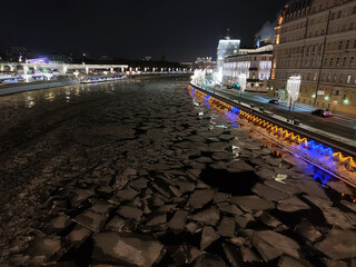 Drifting ice floes on river. ice drift on Moscow river © diy13
