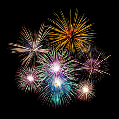 Fireworks of various colors and shapes burst in night sky