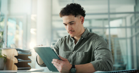 Man, scroll and reading in office with tablet for social media marketing, campaign post or SEO report. Person, browse and review with tech for digital advertising, project upload or brand management.