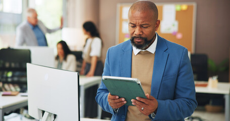 Business, man and reading with tablet in office for research, editing article and draft update....