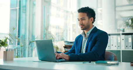 Business, man and typing on laptop in office for financial reporting, policy update or budget review. Finance manager, person or tech at agency for company risk management, email feedback or planning