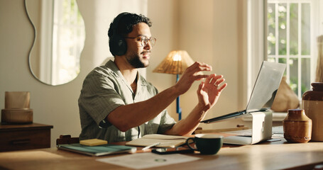 Happy man, video call and laptop with headphones in home for webinar, communication or network....