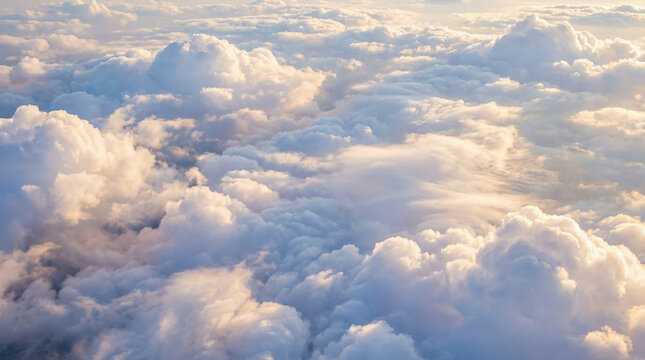 Stunning aerial view of fluffy clouds at golden hour