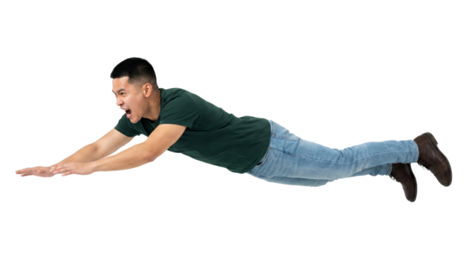 Dynamic full body shot of a young man in mid-air, outstretched arms and shouting with