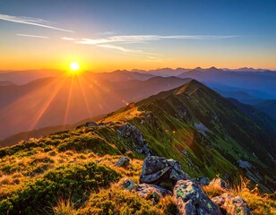 Breathtaking mountain vista as the sun rises, casting golden rays
